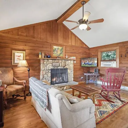 Log Cabin On Peaceful River